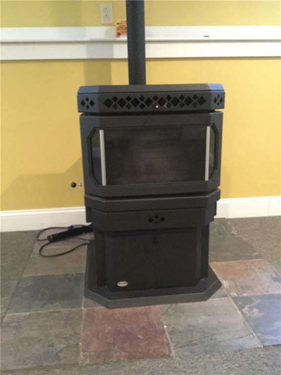 1192 W Road Bowdoin, ME 04287 - Photo 24 of 28 Pellet stove keeps this room very...