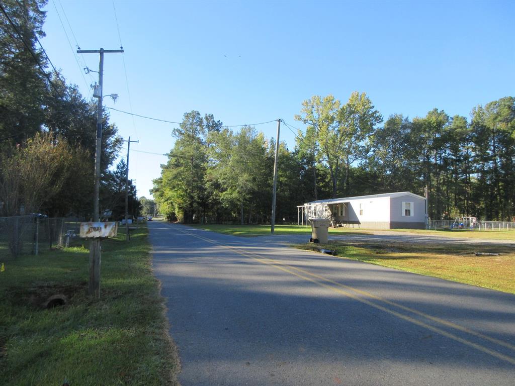 1021 Scarpengo Road Shreveport, LA 71107 - Photo 22 of 22 a view of green field with house in background