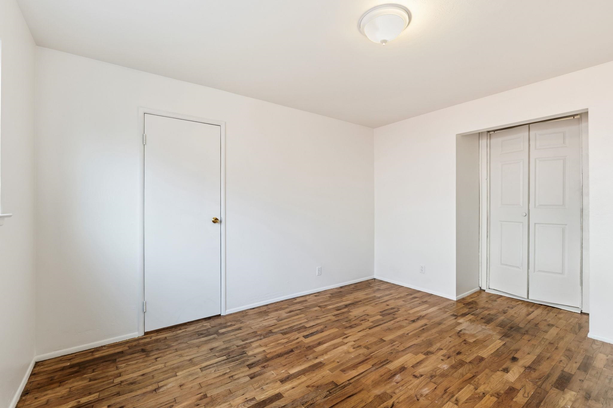 1609 Darwin Street Seaside, CA 93955 - Photo 16 of 26 Unfurnished bedroom with dark wood-type flooring and a closet