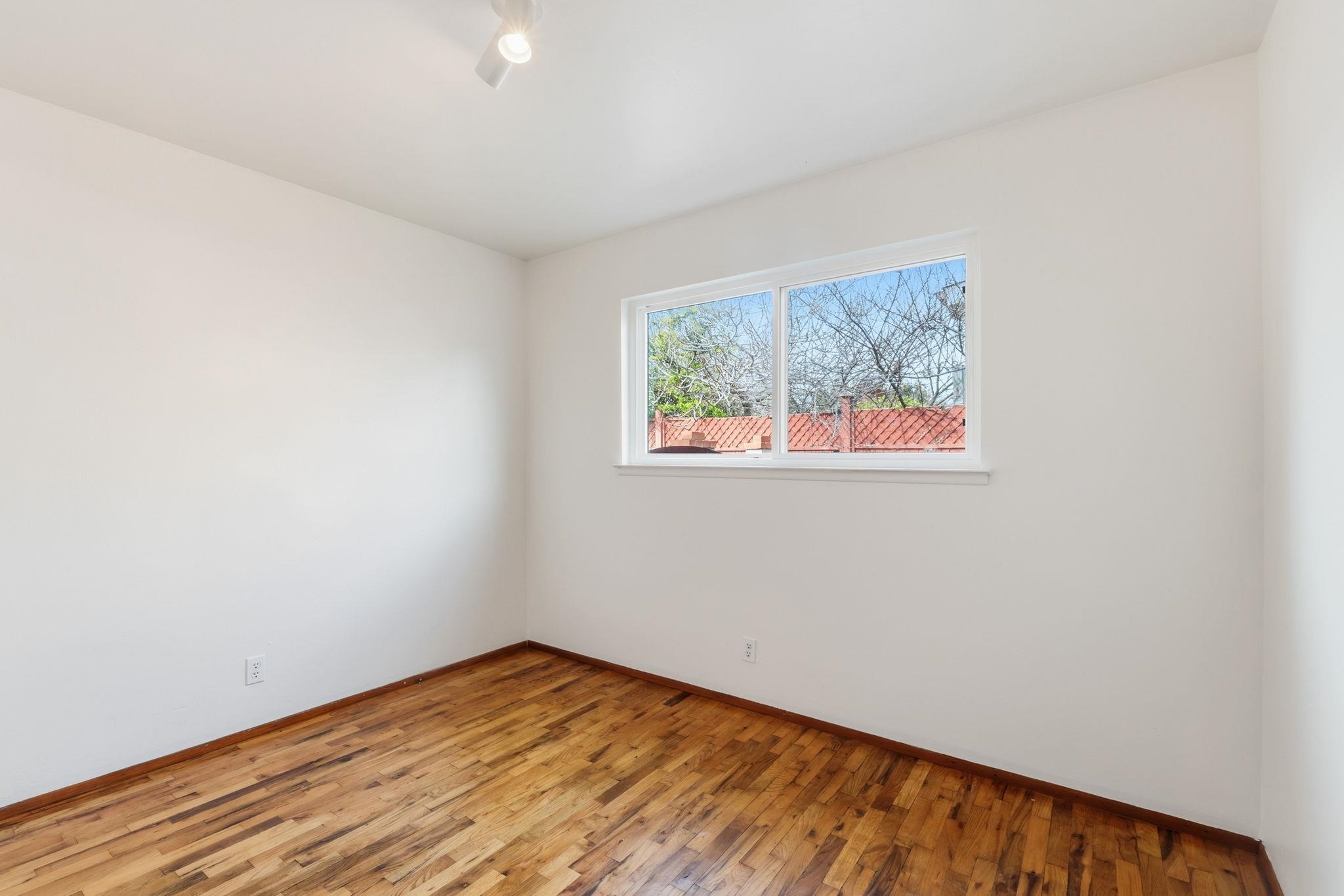 1609 Darwin Street Seaside, CA 93955 - Photo 21 of 26 Unfurnished room with hardwood / wood-style floors and baseboards