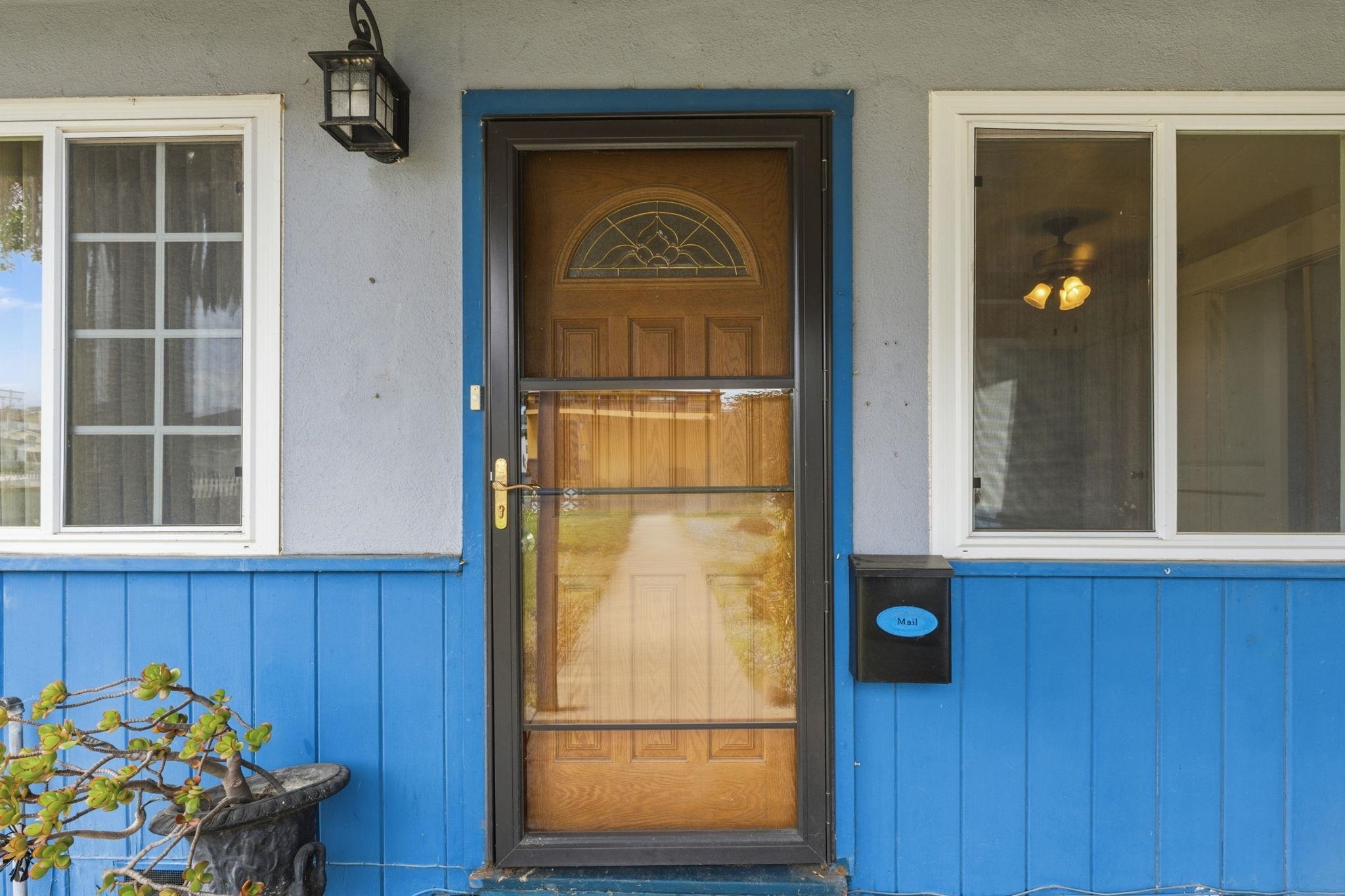1609 Darwin Street Seaside, CA 93955 - Photo 4 of 26 View of exterior entry featuring board and batten siding