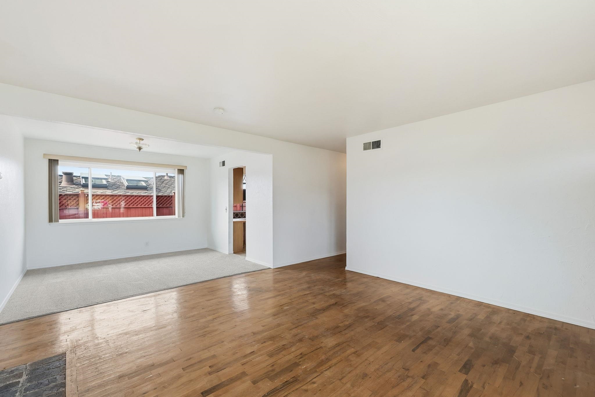 1609 Darwin Street Seaside, CA 93955 - Photo 6 of 26 Unfurnished room featuring wood finished floors and baseboards