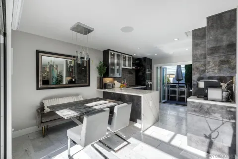 a living room with fireplace furniture and a flat screen tv