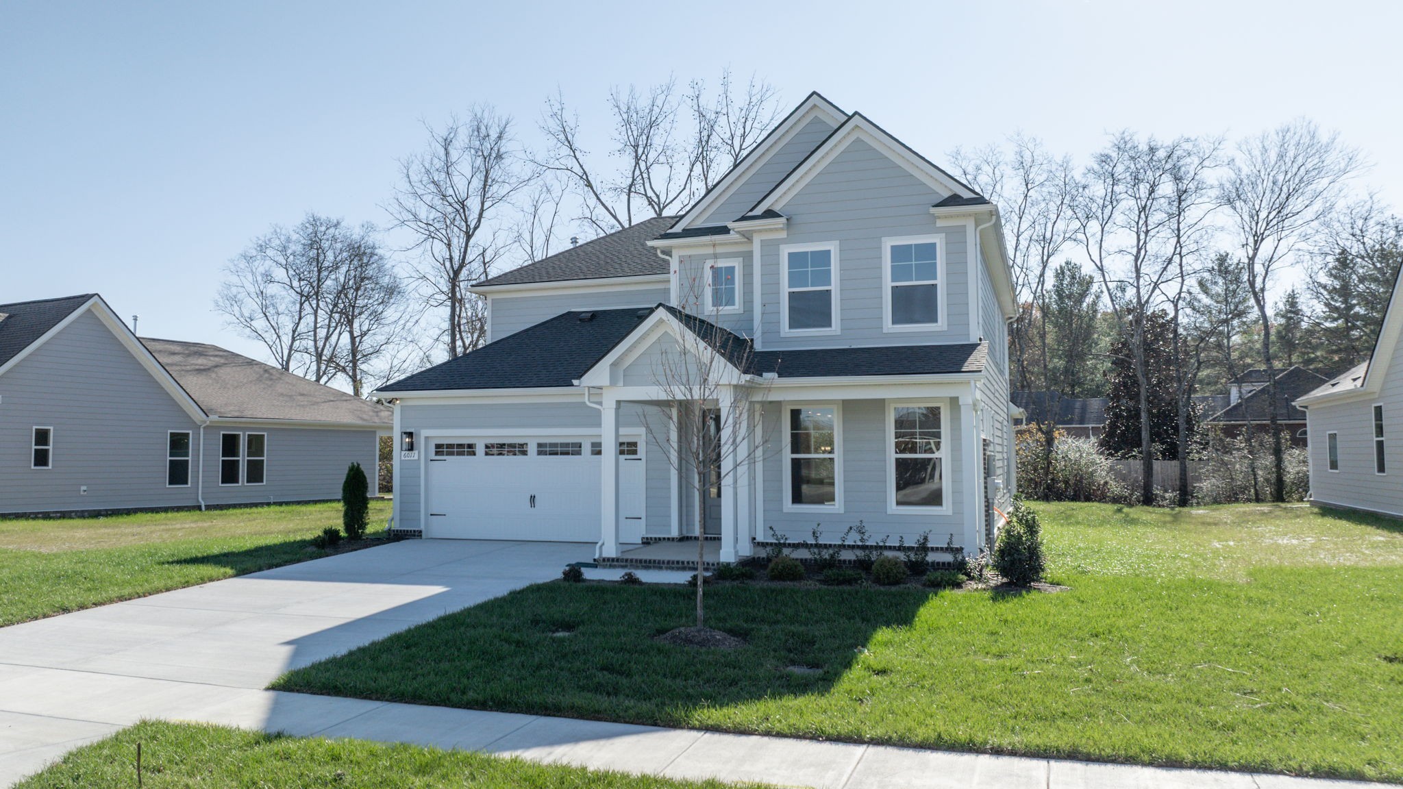 front view of a house with a yard