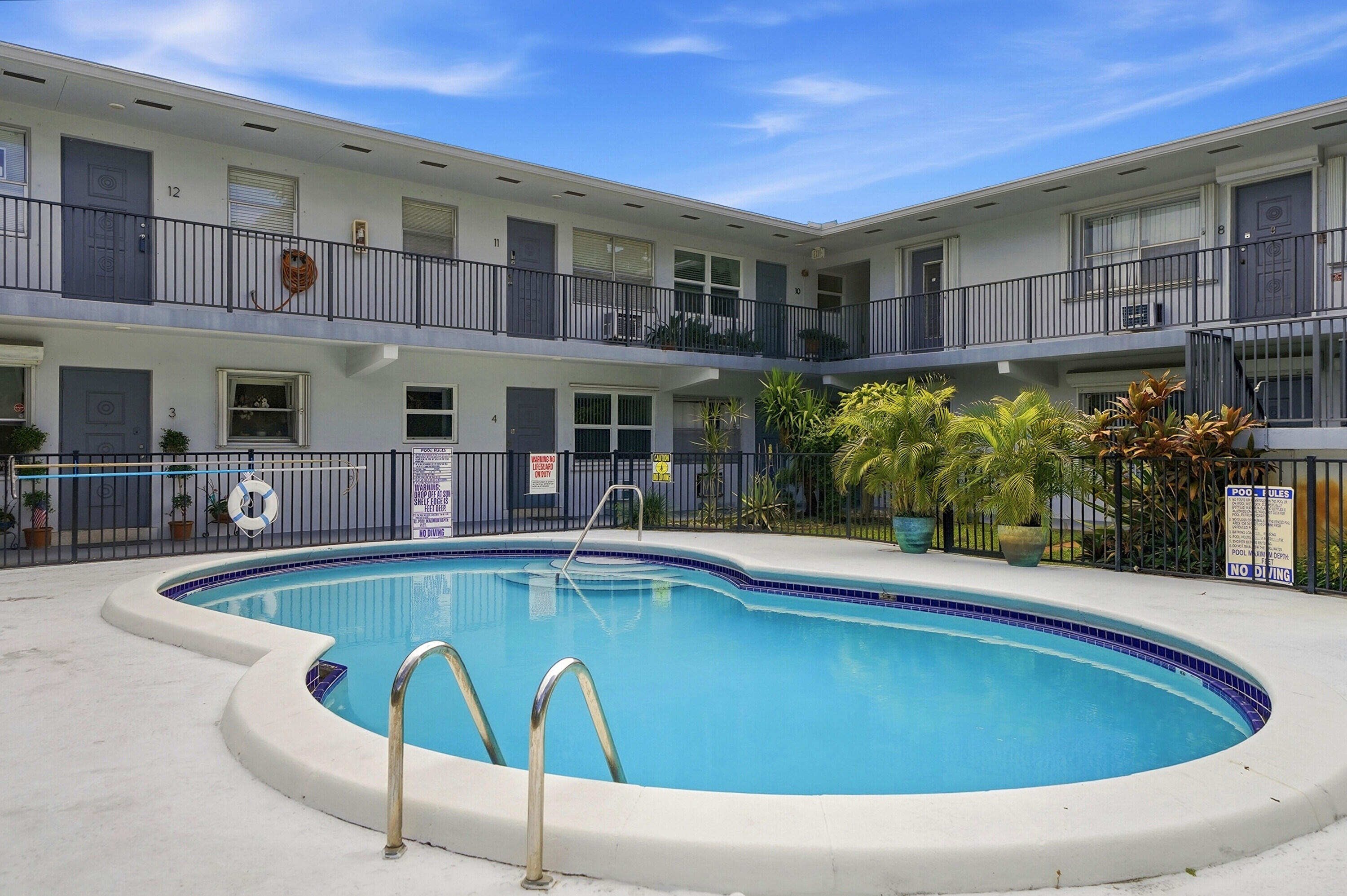 3510 Harrison Street, Unit 4 Hollywood, FL 33021 - Photo 21 of 31 a view of a house with swimming pool