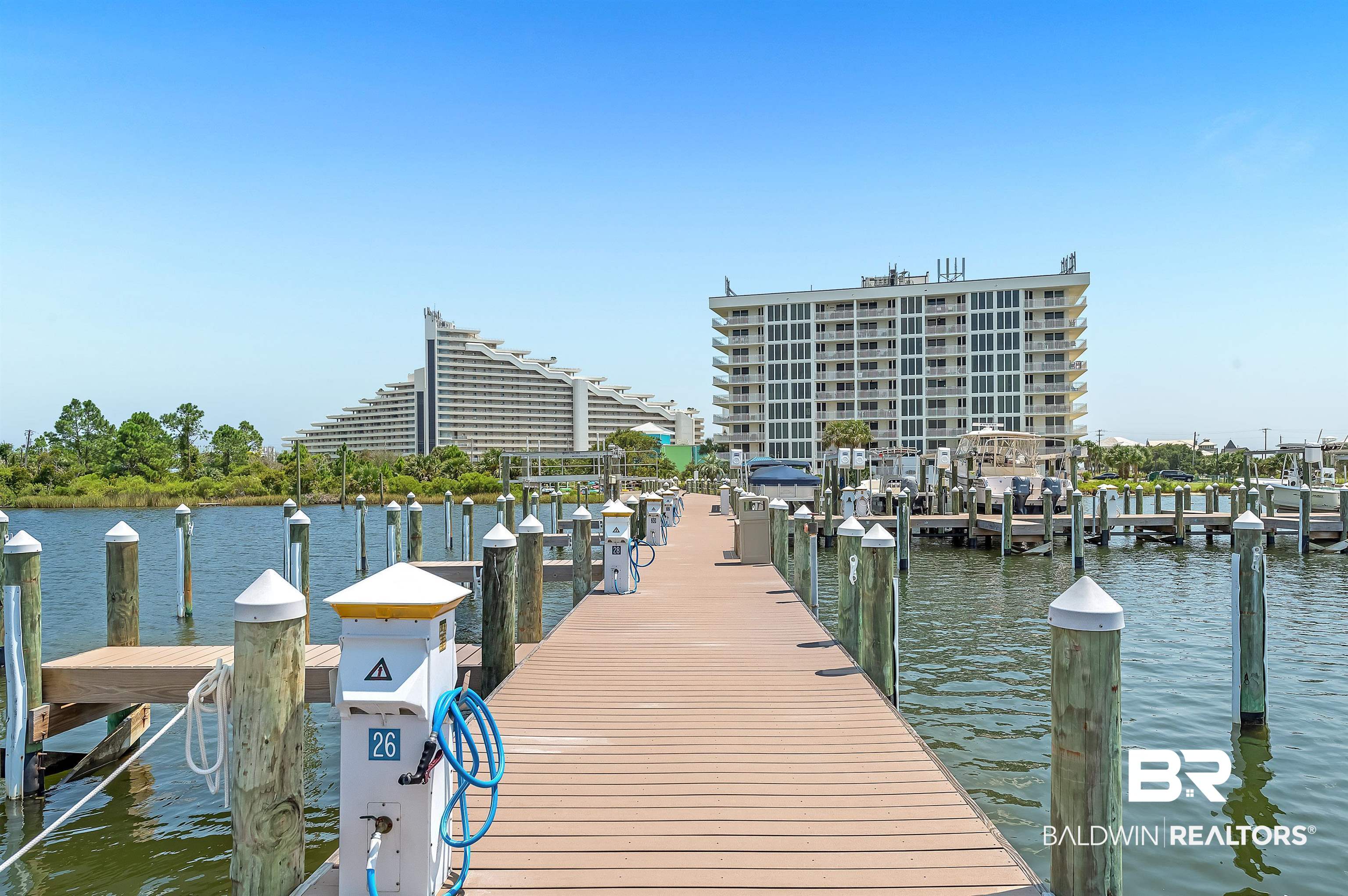 16287 Perdido Key Drive, Unit 105 Pensacola, FL 32507 - Photo 53 of 66 Waterfront pier with composite decking and multiple boat slips