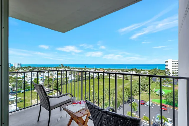 a balcony with outdoor view