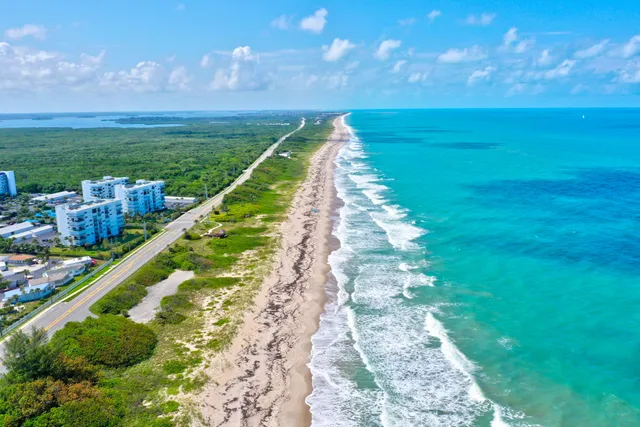 a view of a lake with a big yard