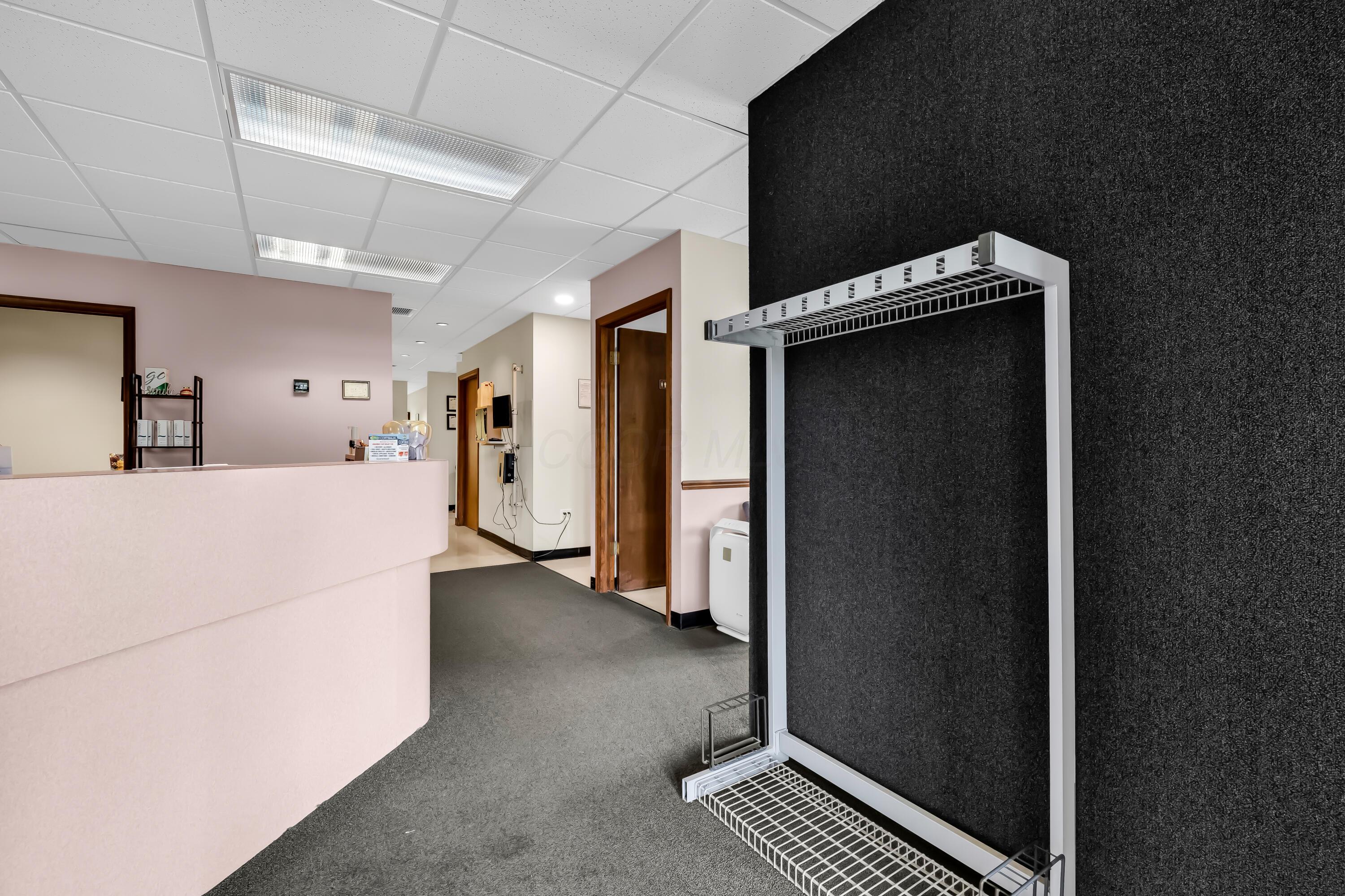 1240 Crescent Heights Road Marion, OH 43302 - Photo 6 of 60 • Blue carpet • Ivory painted walls • Acoustic ceiling tiles