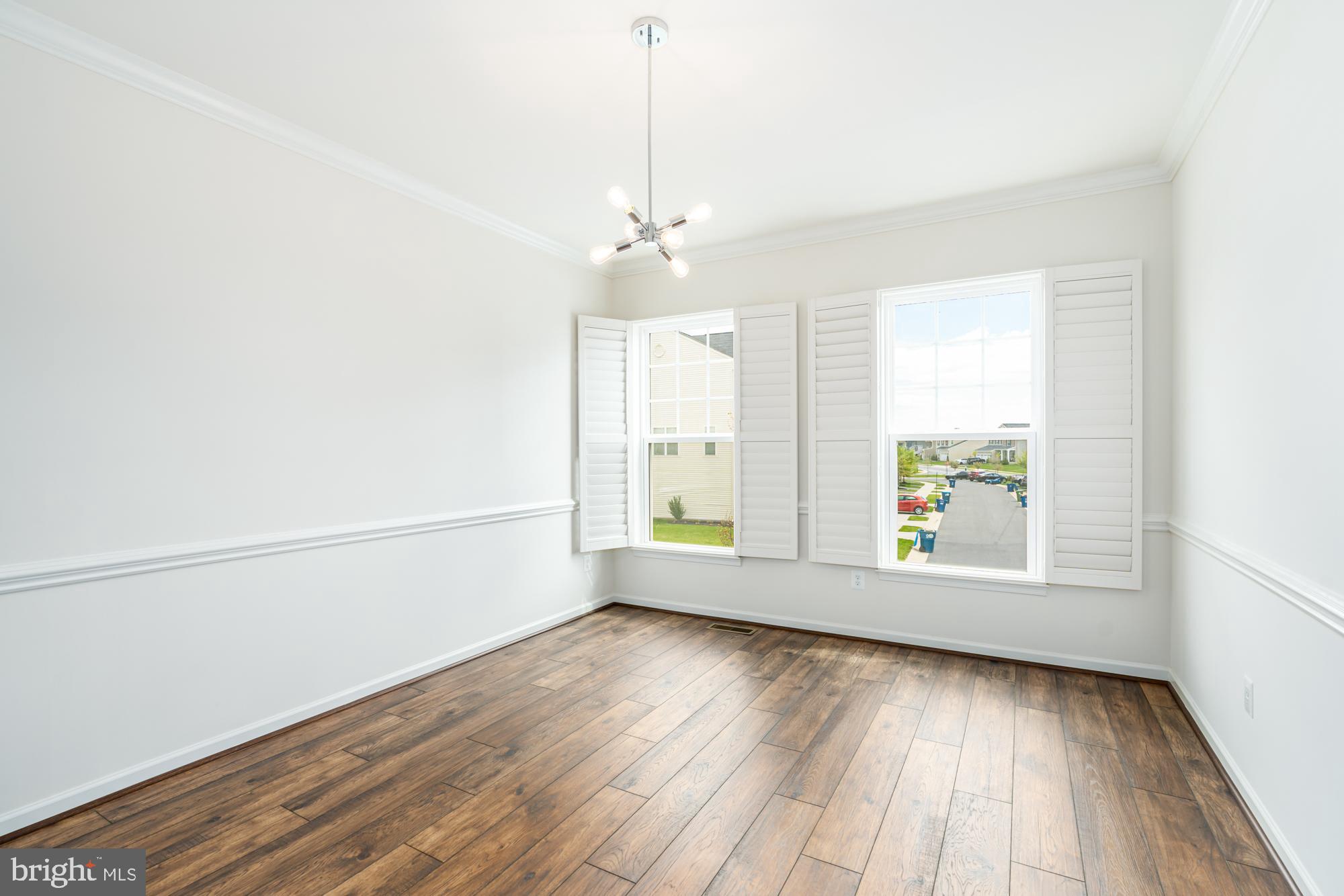 112 Prickly Pear Place Stephenson, VA 22656 - Photo 15 of 31 an empty room with wooden floor and windows