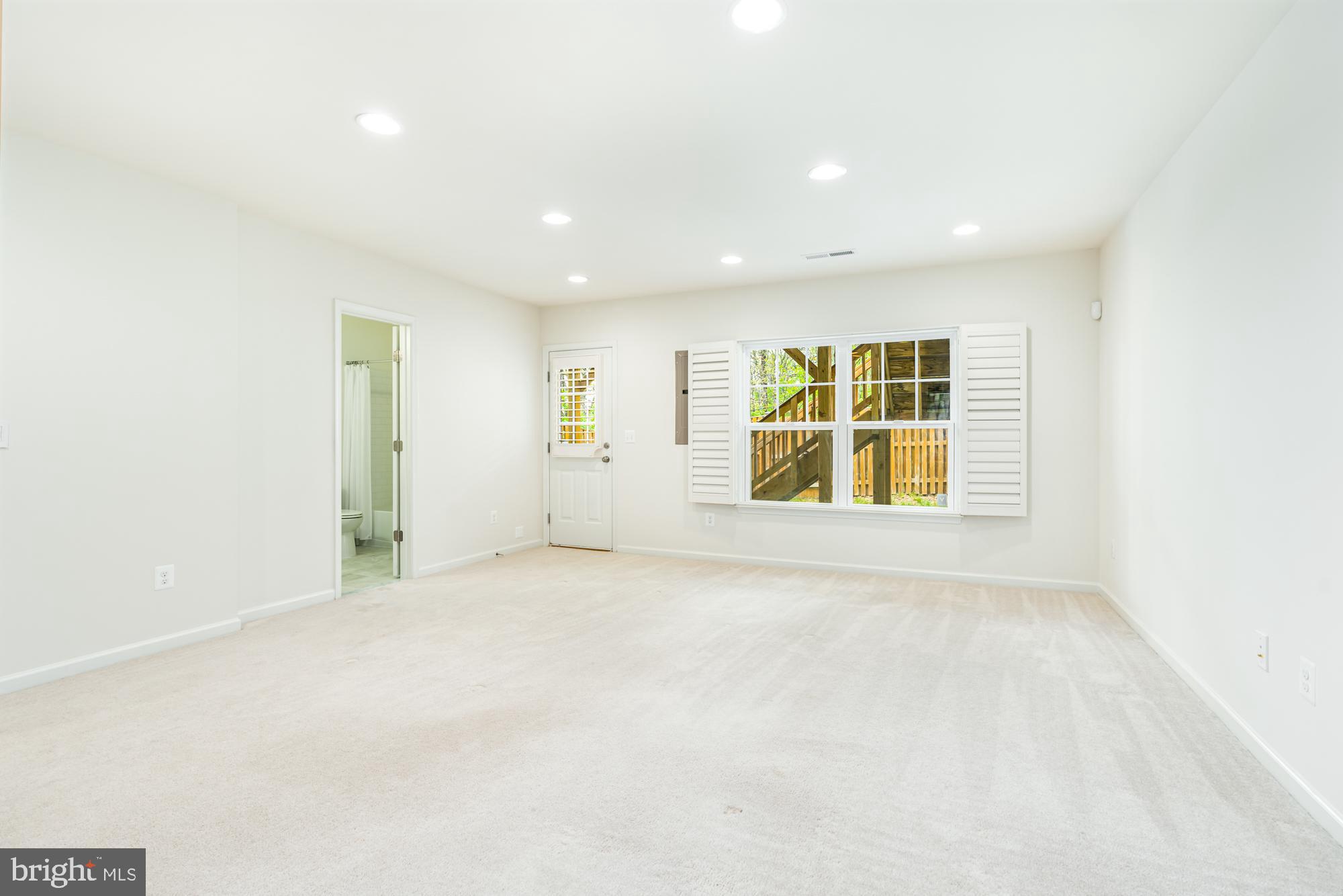 112 Prickly Pear Place Stephenson, VA 22656 - Photo 2 of 31 an empty room with windows and entrance