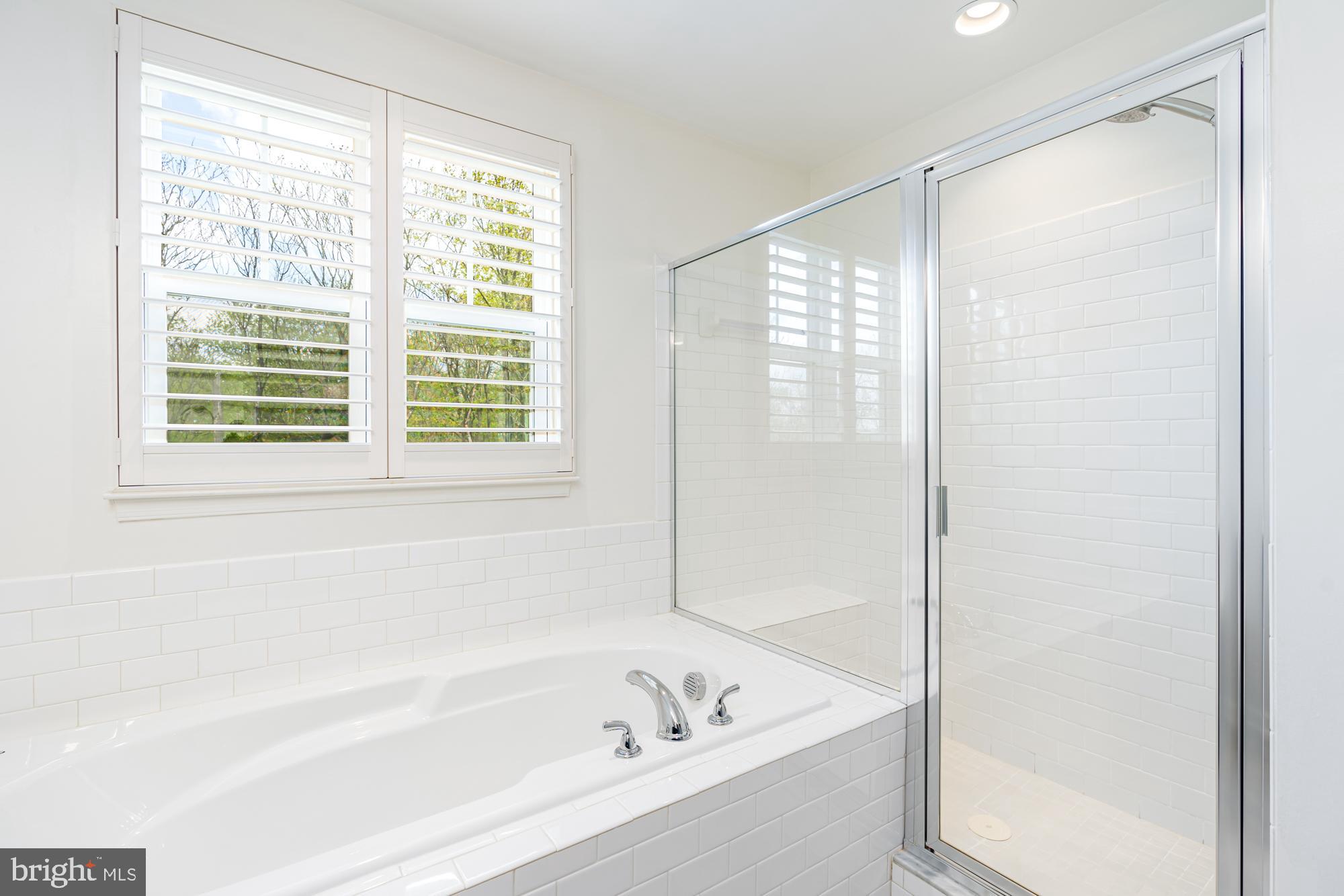 112 Prickly Pear Place Stephenson, VA 22656 - Photo 22 of 31 a bathroom with a bathtub and a shower