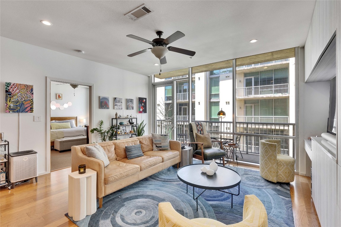 1600 Barton Springs Road, Unit 2403 Austin, TX 78704 - Photo 3 of 40 a living room with furniture and a large window