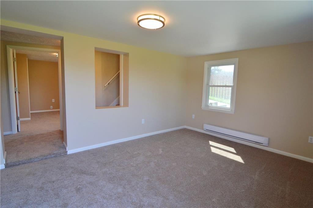 236 Hockey Road Tarrs, PA 15688 - Photo 21 of 25 Lower level bedroom across the hall, this is the lower level game room with walk-out exterior.