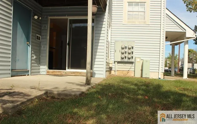 a view of a pathway both side of yard
