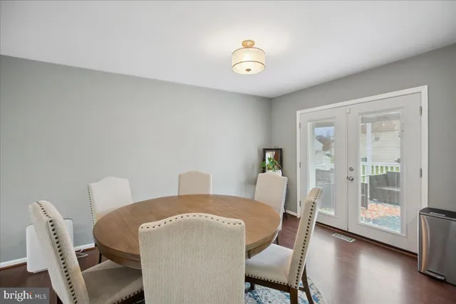 a kitchen with stainless steel appliances granite countertop a sink refrigerator and microwave