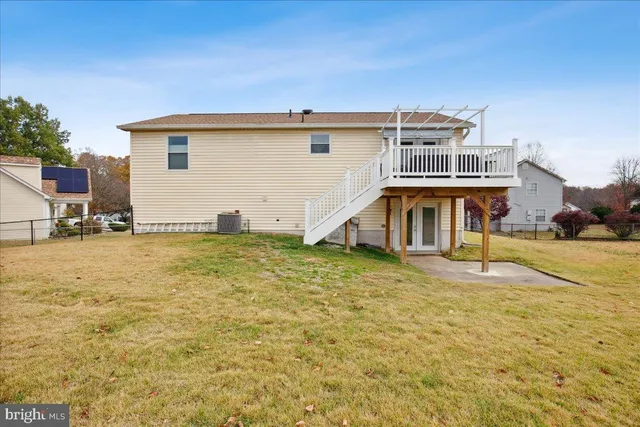 a view of a balcony with furniture