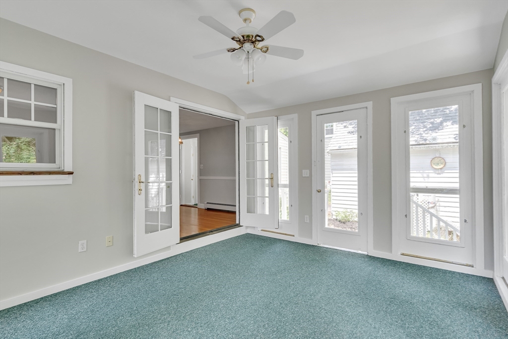 17 Beech Circle Andover, MA 01810 - Photo 12 of 36 a view of an empty room with a window