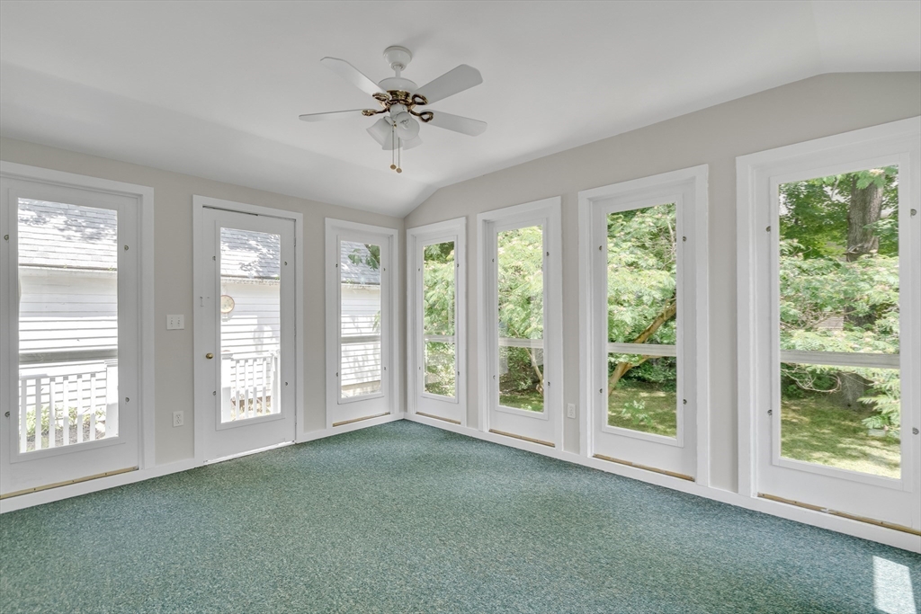 17 Beech Circle Andover, MA 01810 - Photo 15 of 36 a view of an empty room with a window