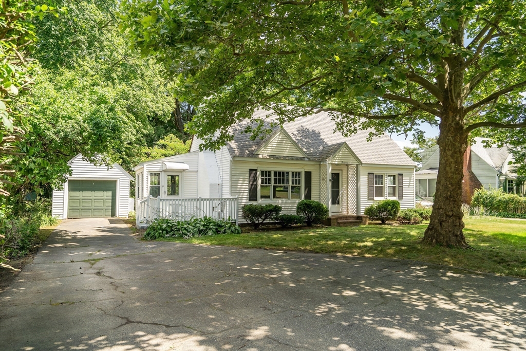 17 Beech Circle Andover, MA 01810 - Photo 2 of 36 a front view of a house with a garden