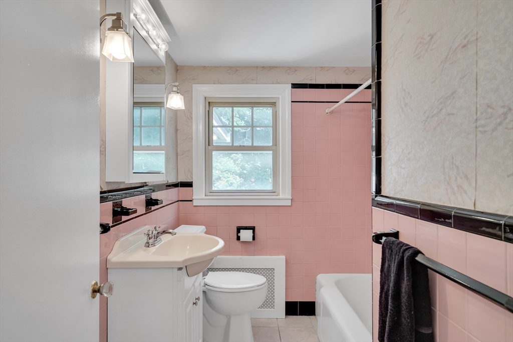 17 Beech Circle Andover, MA 01810 - Photo 23 of 36 a bathroom with a sink toilet and mirror