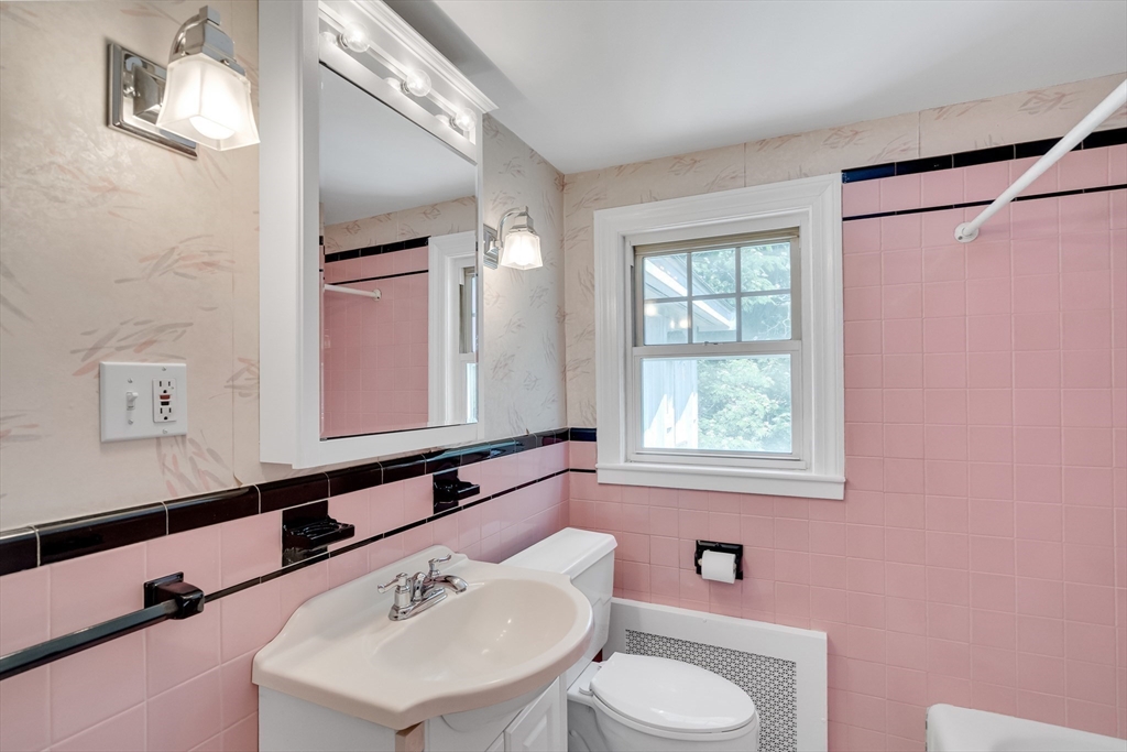 17 Beech Circle Andover, MA 01810 - Photo 24 of 36 a bathroom with a sink a toilet and a mirror