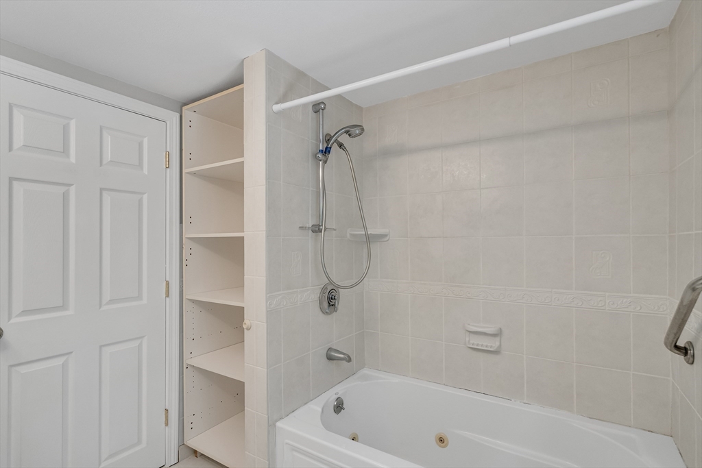 17 Beech Circle Andover, MA 01810 - Photo 32 of 36 a bathroom with a bath tub