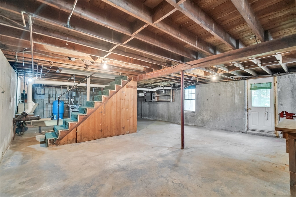 17 Beech Circle Andover, MA 01810 - Photo 36 of 36 a view of a room with wooden stairs
