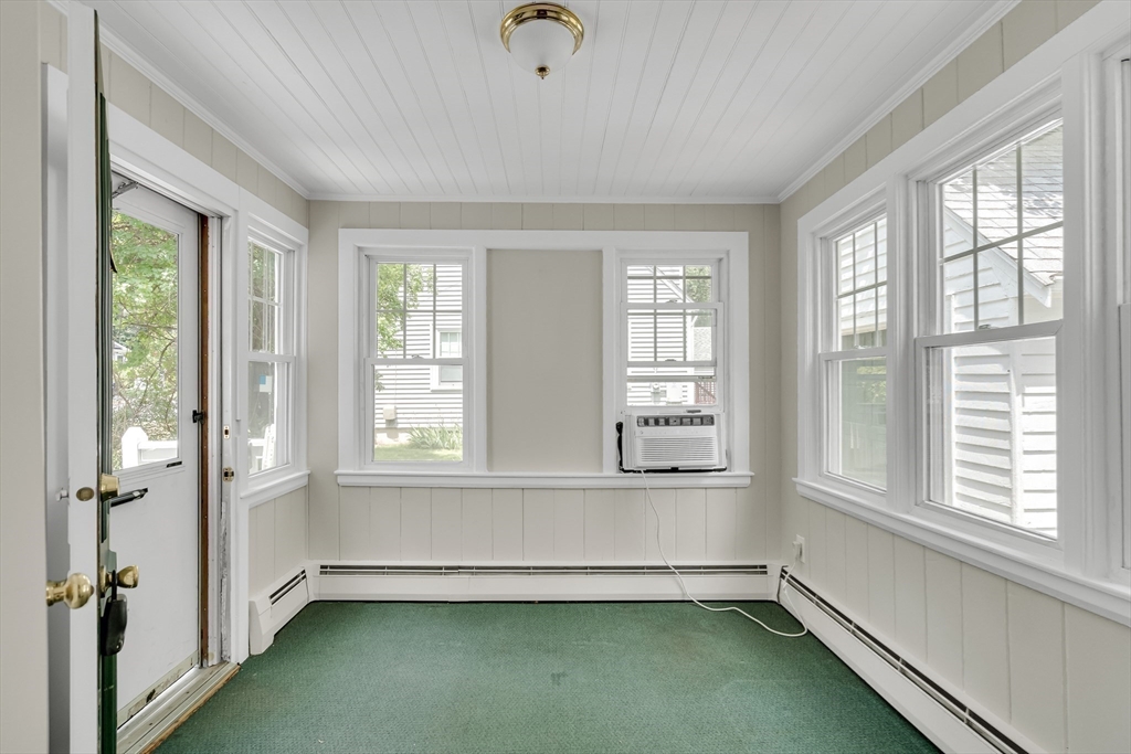 17 Beech Circle Andover, MA 01810 - Photo 8 of 36 a view of an empty room with a window