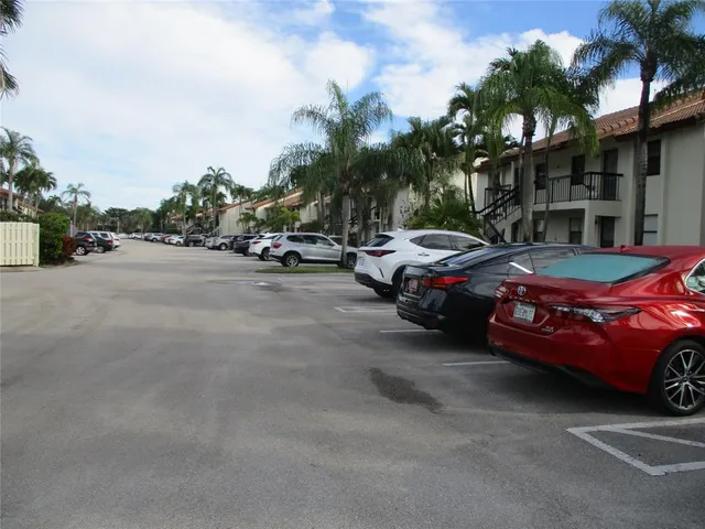 a cars parked in front of a house