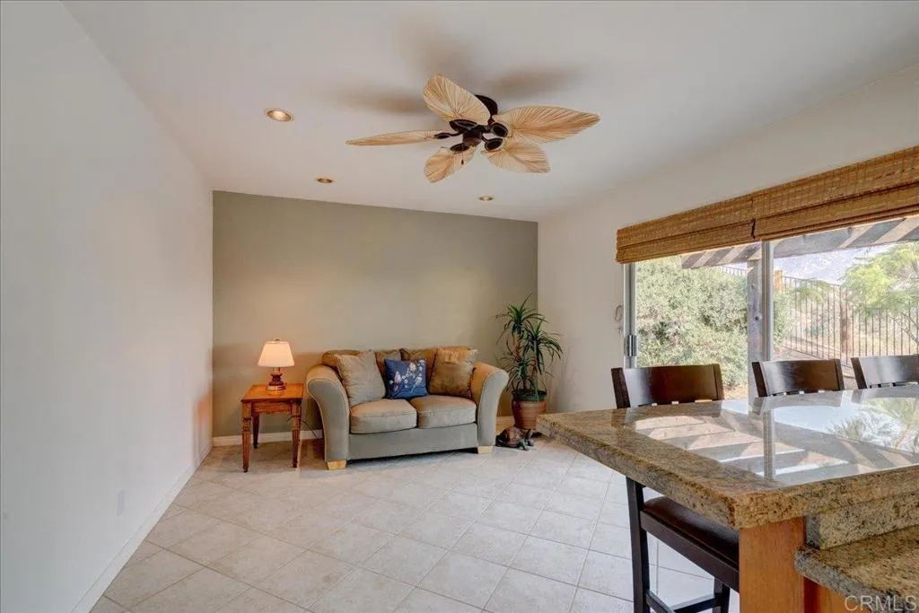 15753 Lyons Valley Road Jamul, CA 91935 - Photo 14 of 47 a living room with furniture and a large window