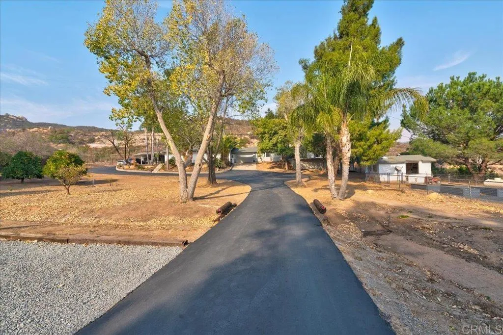 15753 Lyons Valley Road Jamul, CA 91935 - Photo 2 of 47 a view of yard with tree in front of it