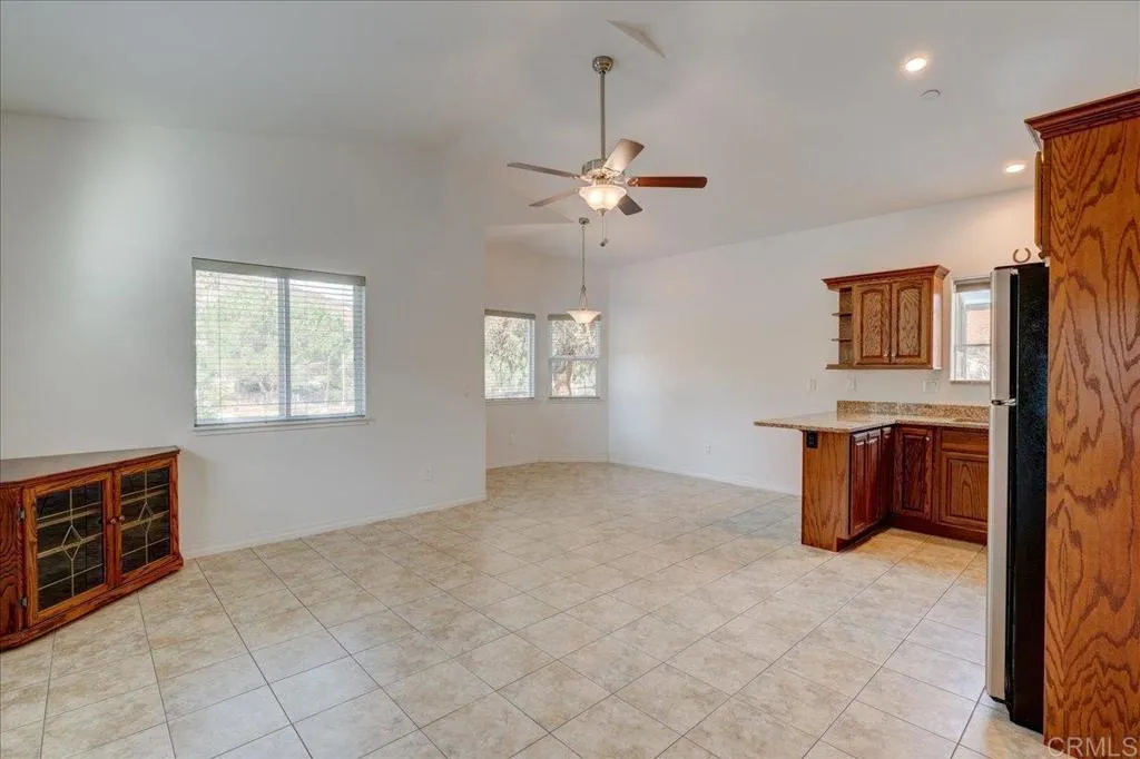 15753 Lyons Valley Road Jamul, CA 91935 - Photo 27 of 47 a view of kitchen with granite countertop cabinets and window