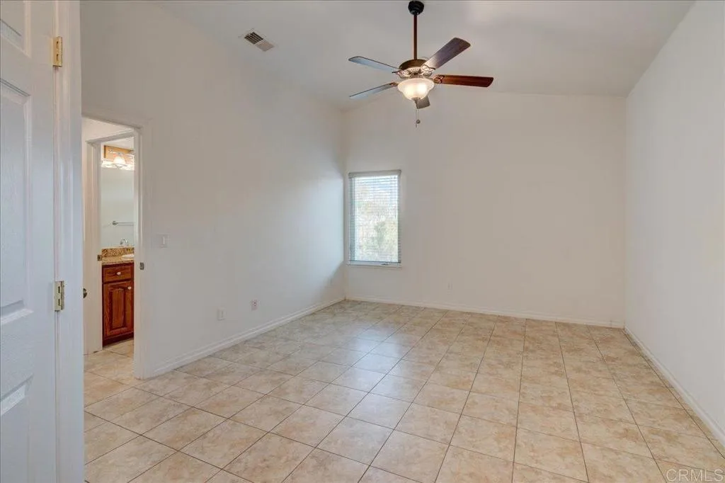 15753 Lyons Valley Road Jamul, CA 91935 - Photo 31 of 47 an empty room that has a window in it