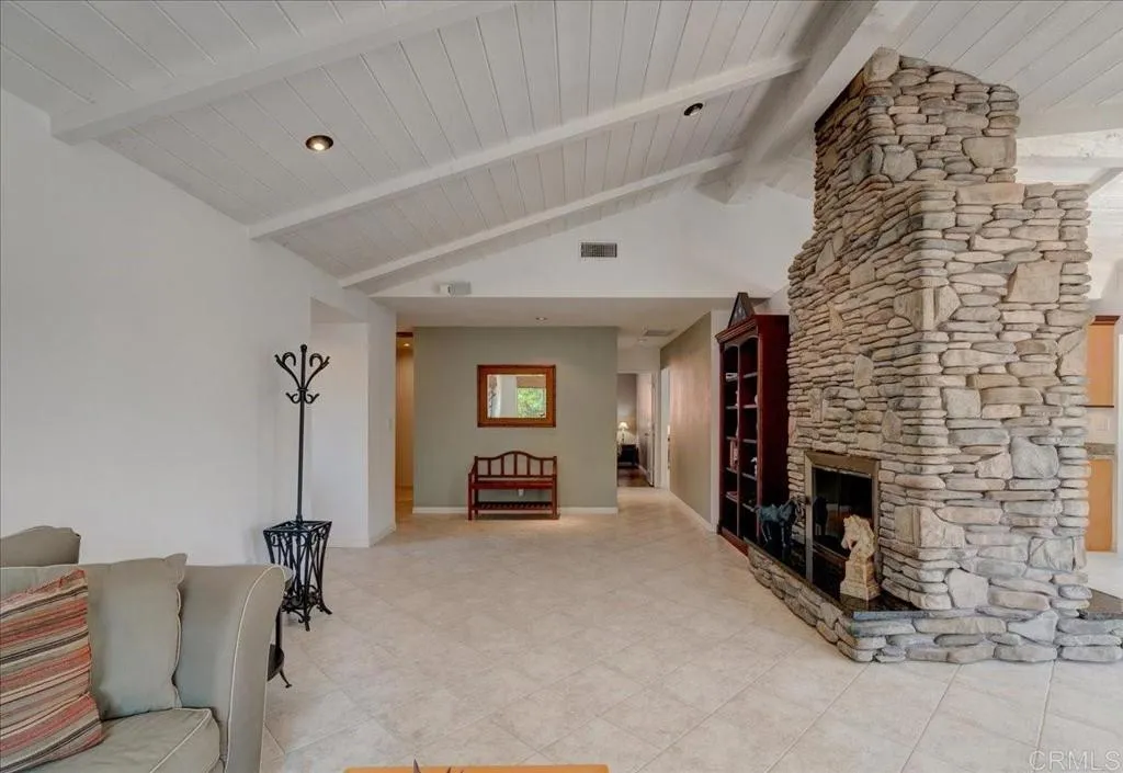 15753 Lyons Valley Road Jamul, CA 91935 - Photo 6 of 47 a view of a livingroom with furniture and a fireplace