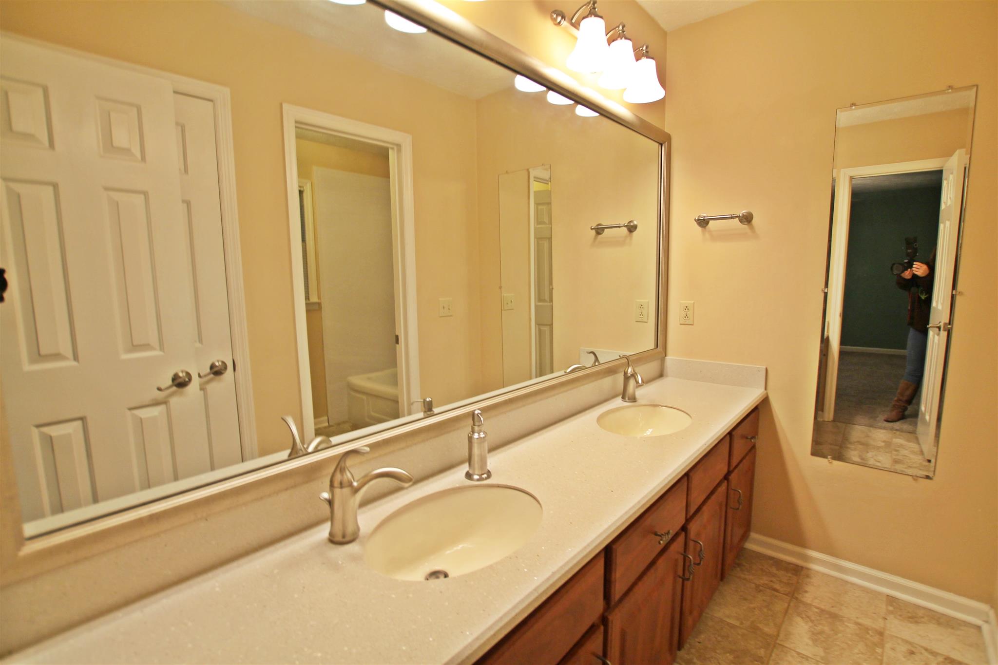 802 Deer Run Springfield, TN 37172 - Photo 14 of 25 a bathroom with a granite countertop tub sink and mirror