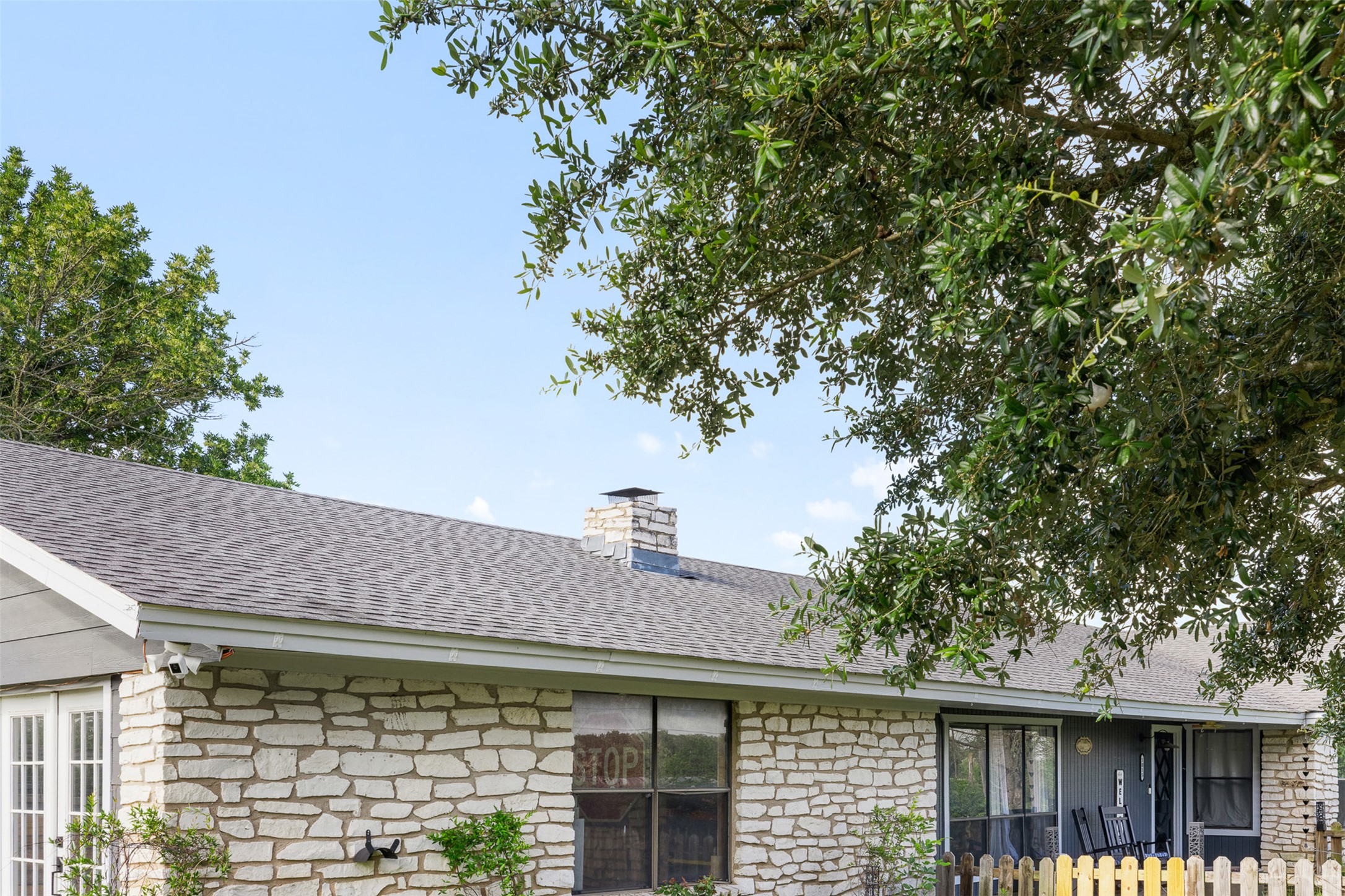 1015 FM 112 Road Lexington, TX 78947 - Photo 2 of 38 a front view of a house with a garden