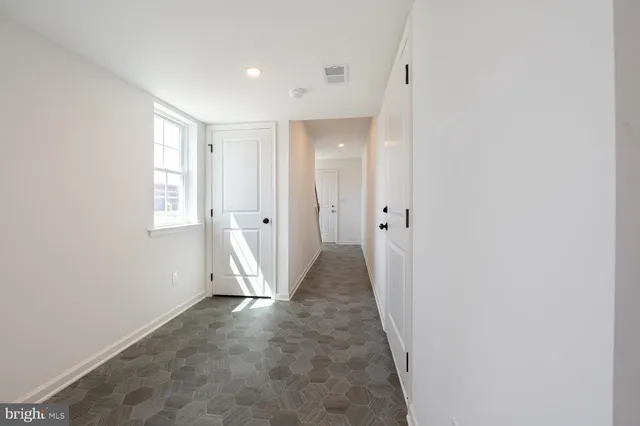 a view of hallway with stairs