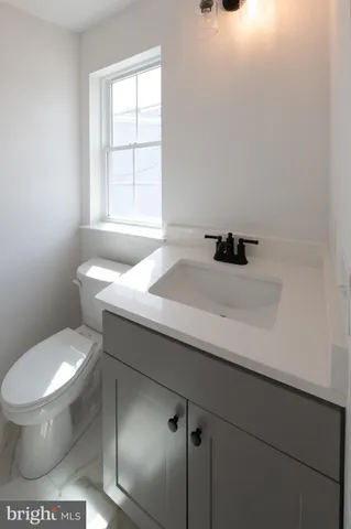 a bathroom with a sink and a toilet