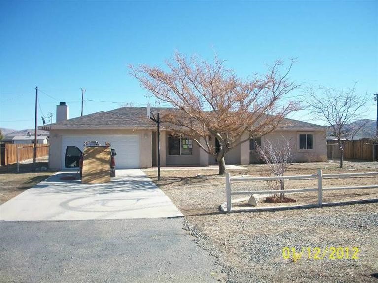 14767 Temecula Road Apple Valley, CA 92307 - Photo 1 of 1 a view of the house with a outdoor space