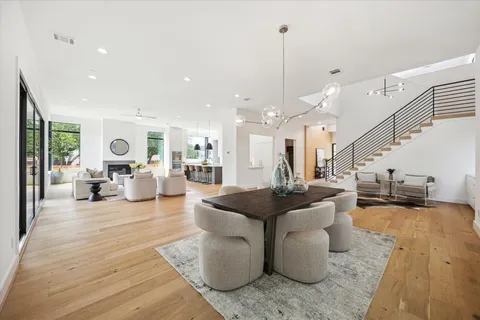 a living room with furniture a window and appliances