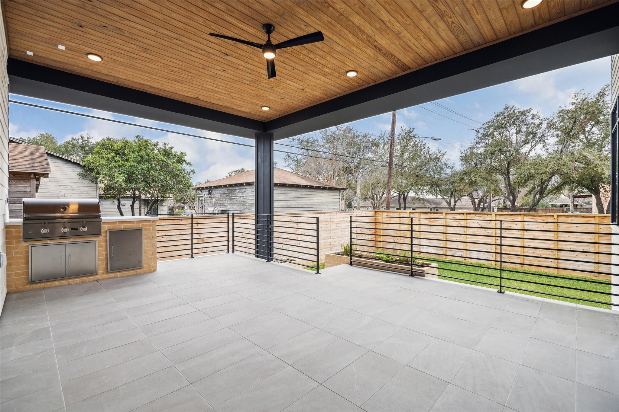 3851 Merrick Street Houston, TX 77025 - Photo 36 of 47 Rear and Front patio ceiling finished with stained natural wood.