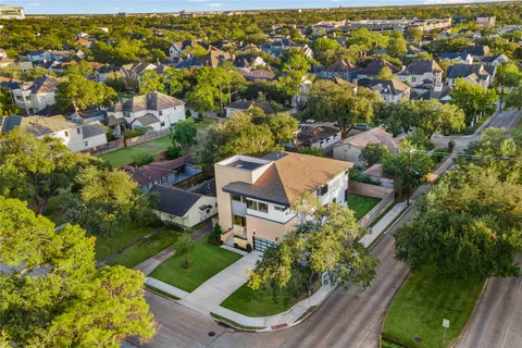 a view of house with backyard