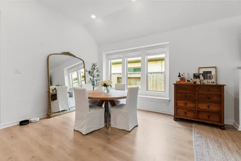a view of a livingroom with furniture and a window