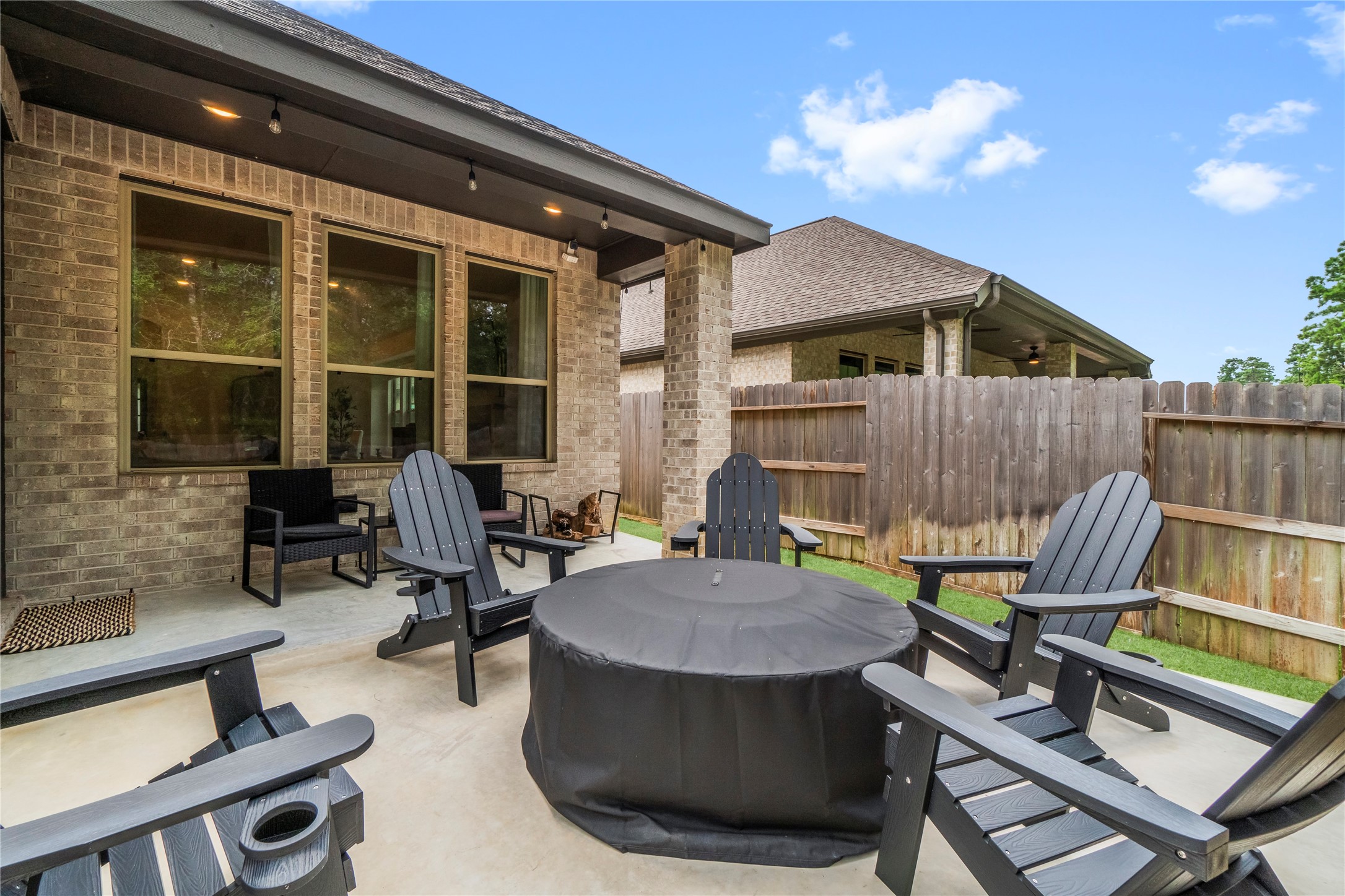 17375 Merigold Hts Drive Conroe, TX 77302 - Photo 31 of 36 Extended patio, perfect for entertaining!
