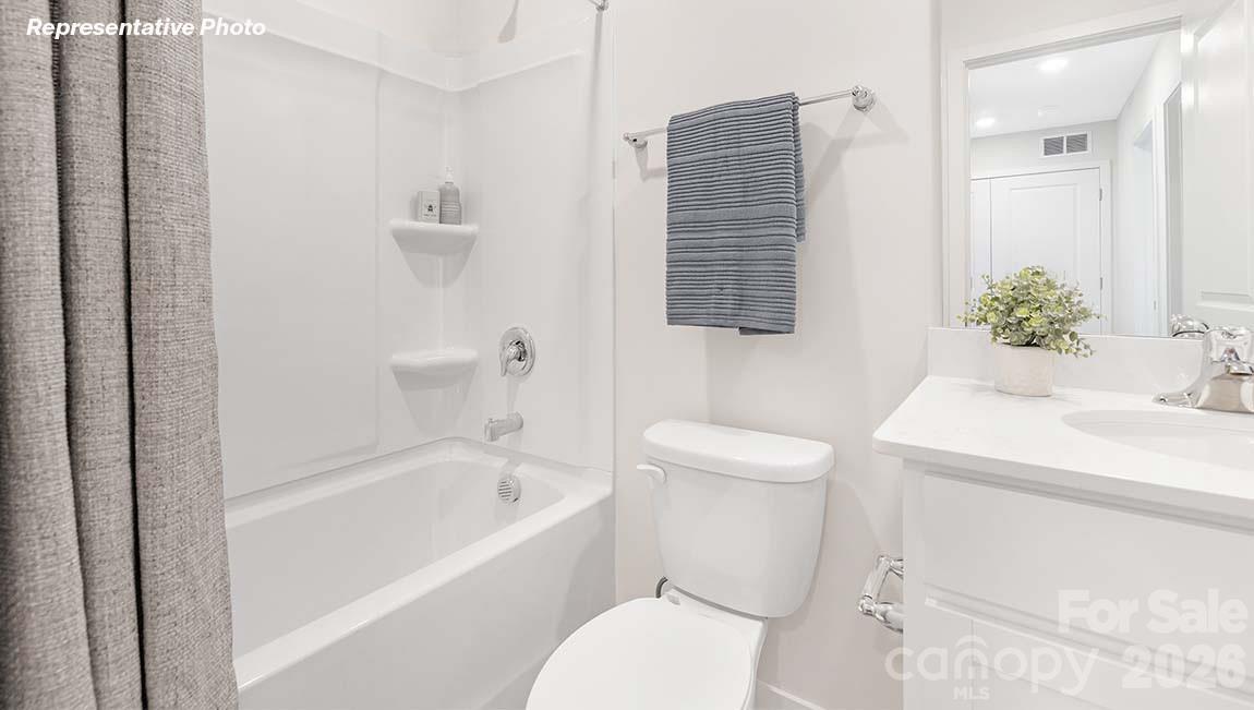 3269 Ora Smith Road Lincolnton, NC 28092 - Photo 17 of 21 a bathroom with a sink toilet and bathtub