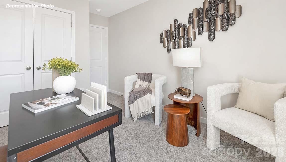 3269 Ora Smith Road Lincolnton, NC 28092 - Photo 18 of 21 a living room with furniture and a lamp