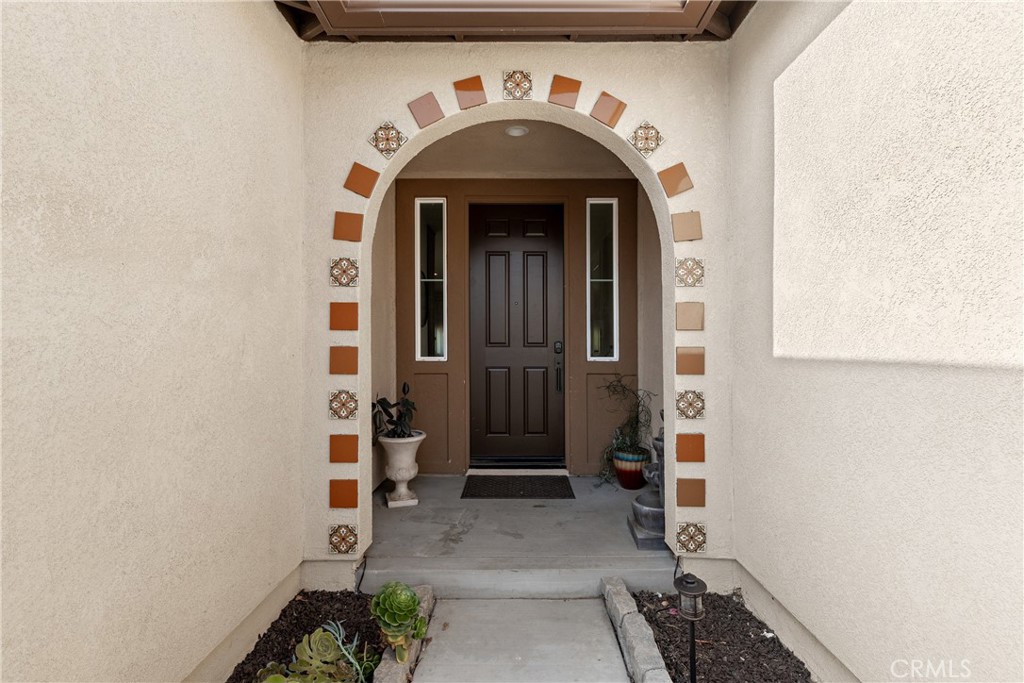 28341 Heather Grn Way Menifee, CA 92584 - Photo 4 of 44 Beautiful spanish tile accented entryway