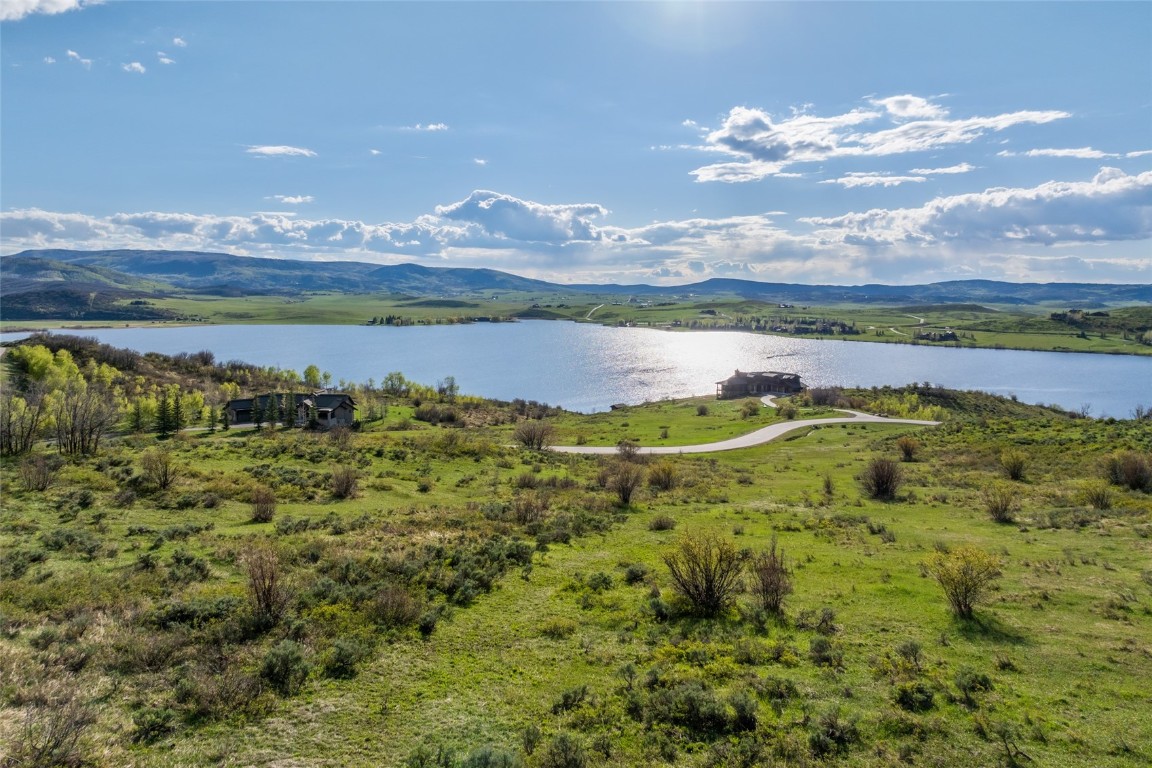 30105 Harrison Trail Steamboat Springs, CO 80487 - Photo 4 of 25 a view of a lake with a mountain in the background