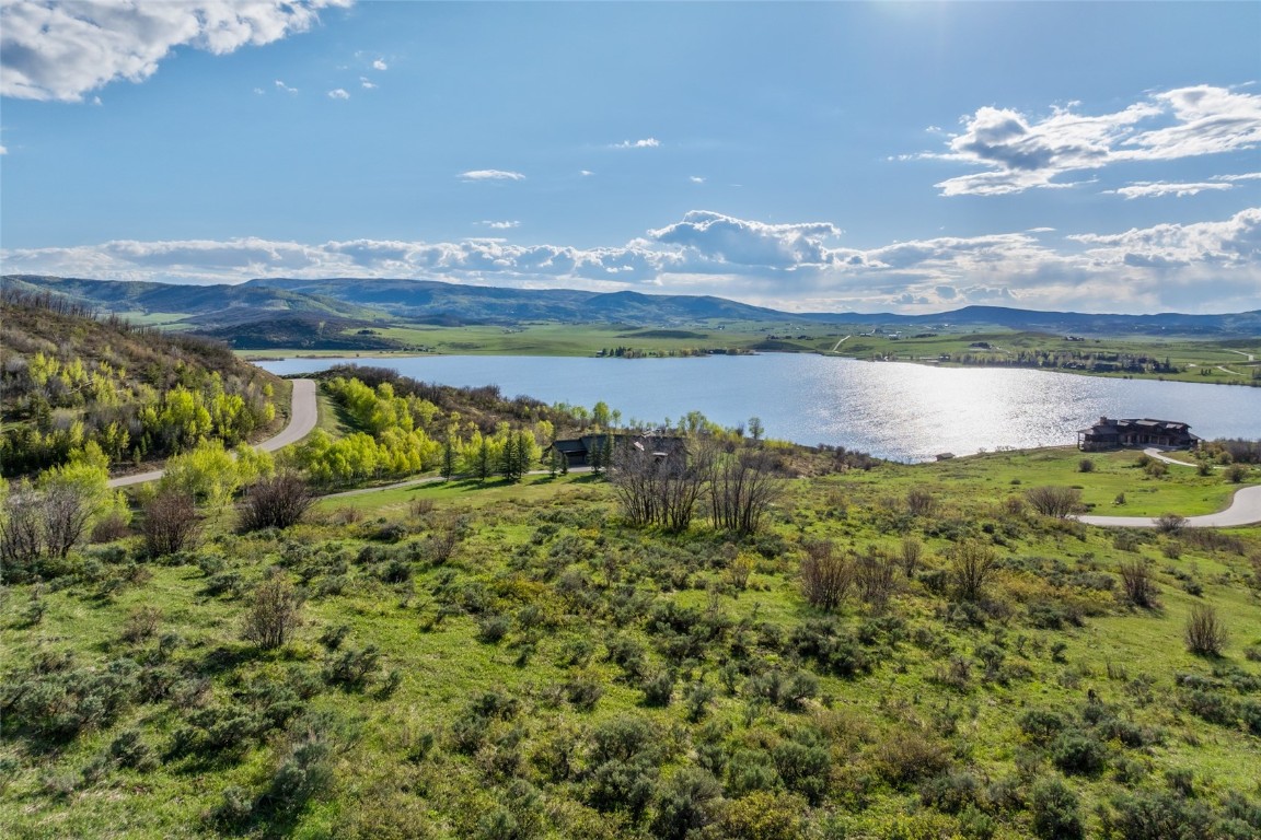 30105 Harrison Trail Steamboat Springs, CO 80487 - Photo 5 of 25 a view of a lake with a mountain in the background